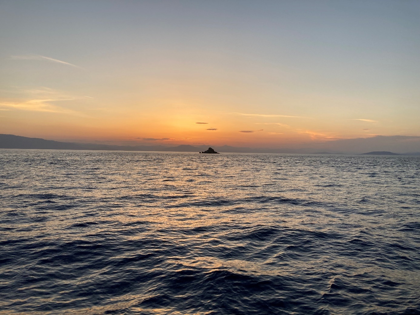 Une image contenant extérieur, ciel, eau, crépuscule
Description générée automatiquement