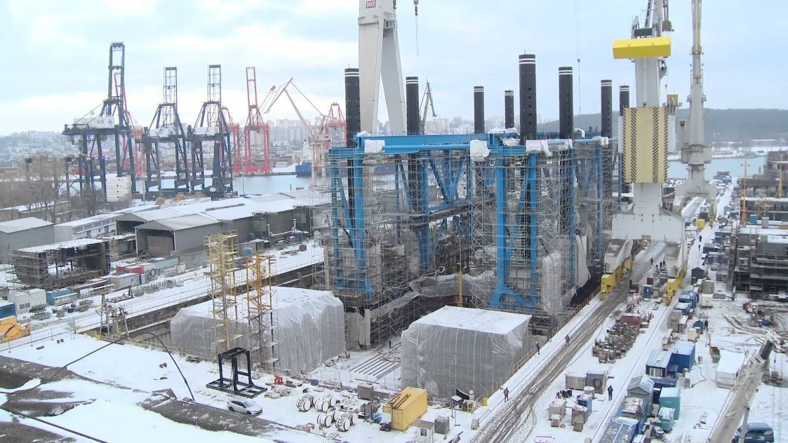 Une image contenant ciel, plein air, industrie, construction Description générée automatiquement