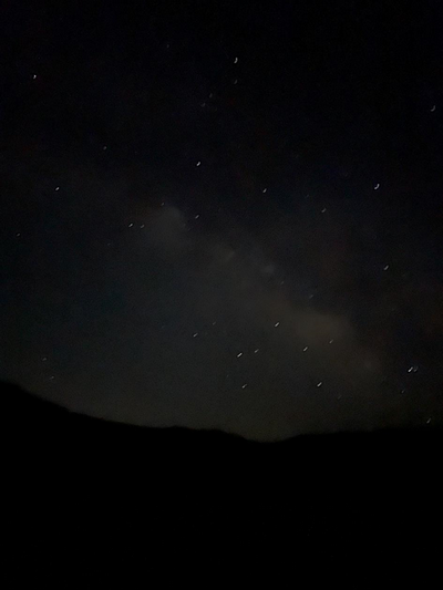 Une image contenant ciel, plein air, nuit, constellation
Description générée automatiquement